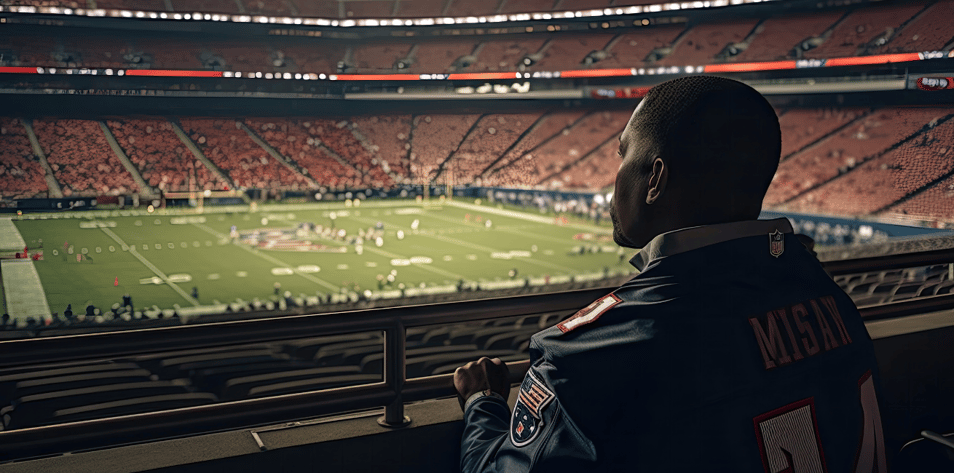 American football fan watching a game at the stadium